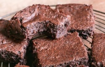 Delicious Barnyard millet Chocolate Brownie topped with chocolate drizzle, showing a healthy and rich dessert option.