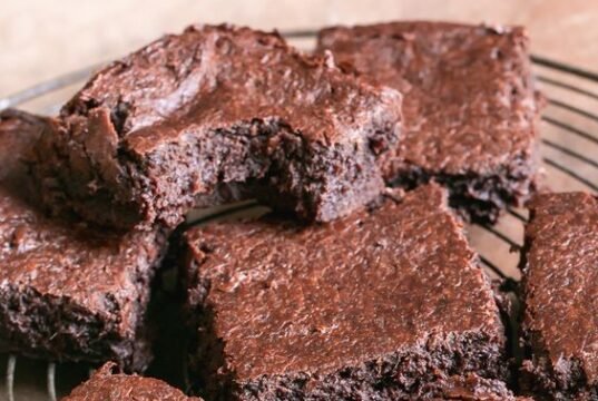 Delicious Barnyard millet Chocolate Brownie topped with chocolate drizzle, showing a healthy and rich dessert option.