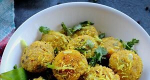 A bowl of steamed bajra vada with tadka